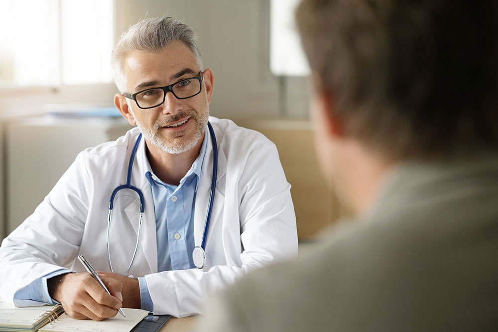 How to Get a Prescription for Testosterone Online Doctor Giving a Paper to Patient