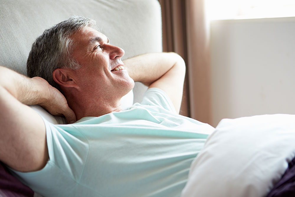Taking HGH and Testosterone Together Older Man Lying
