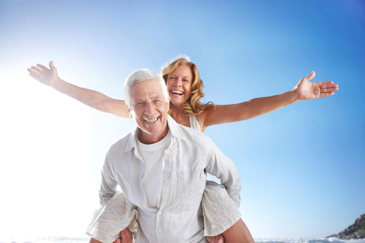 Testosterone Therapy Cost Per Month Happy Middle-Aged Couple