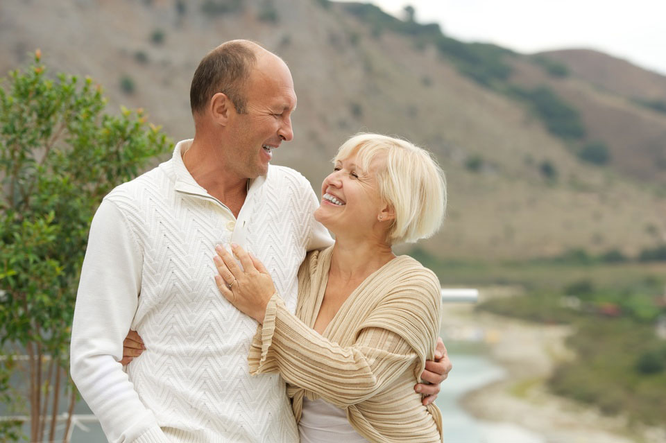 Testosterone Replacement Therapy Cost No Insurance Middle-Aged Couple Outdoors